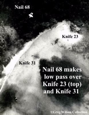 Nail 68 makes low pass over knife 23 and knife 31